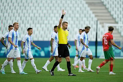 Referee disallows a goal scored by Argentina's Cristian Medina